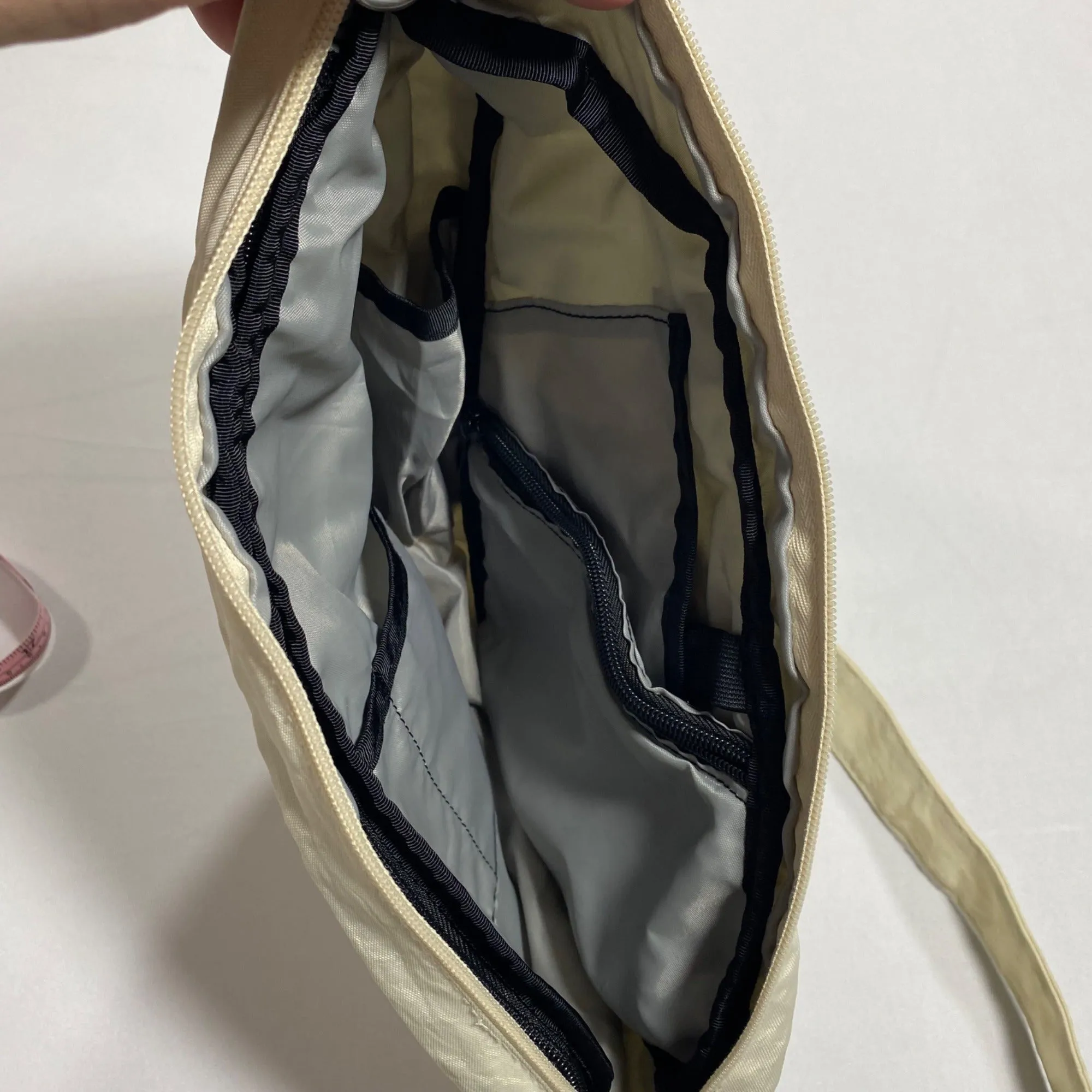 Ameribag Small Beige Distressed Nylon Teardrop Crossbody Sling Bag