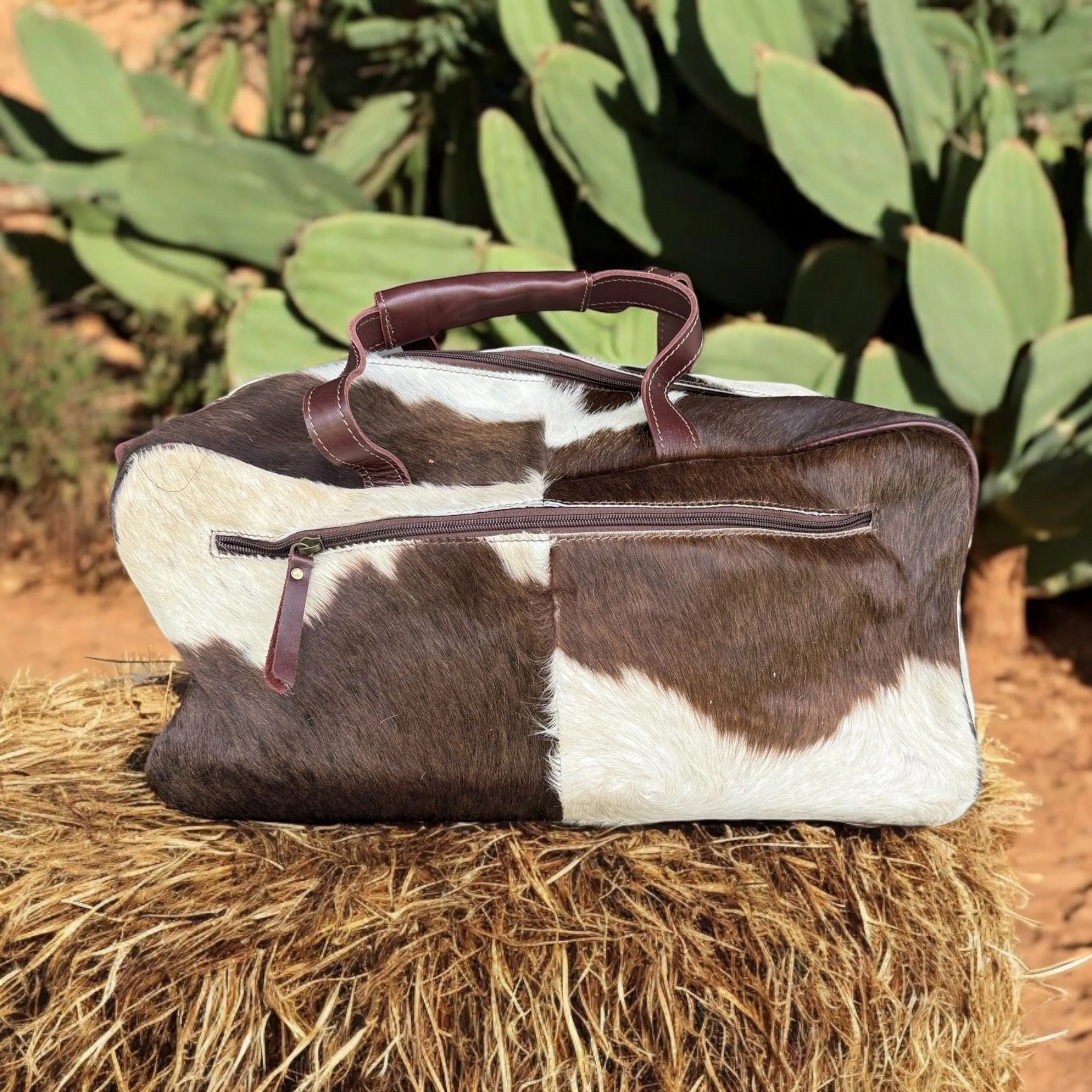 Cowhide Duffle Bag Brown And White Front Pockets