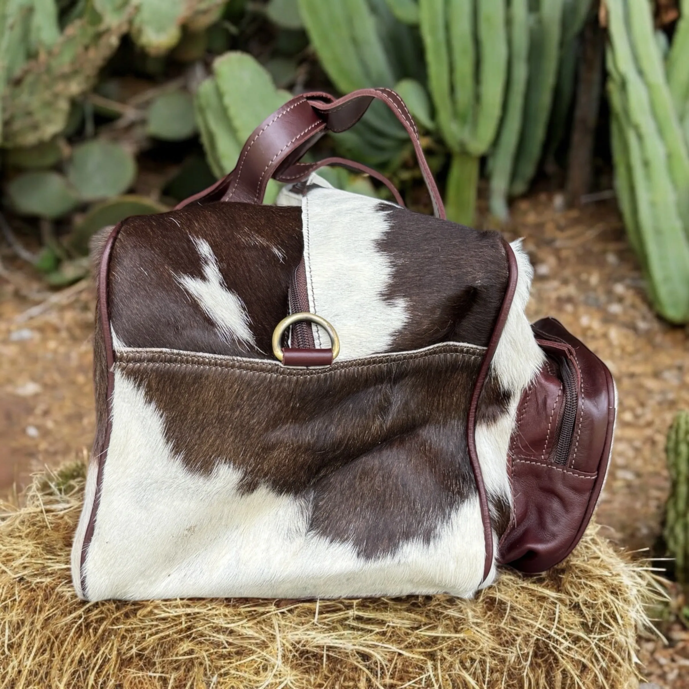 Cowhide Duffle Bag Brown And White Front Pockets