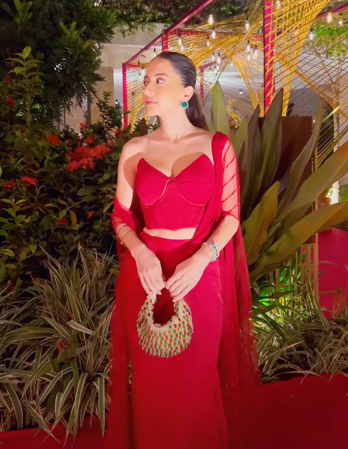 Komal Kapoor in our Red Green Multi Nano Boat Bag