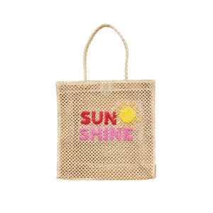 Natural Woven Word Tote By Mud Pie