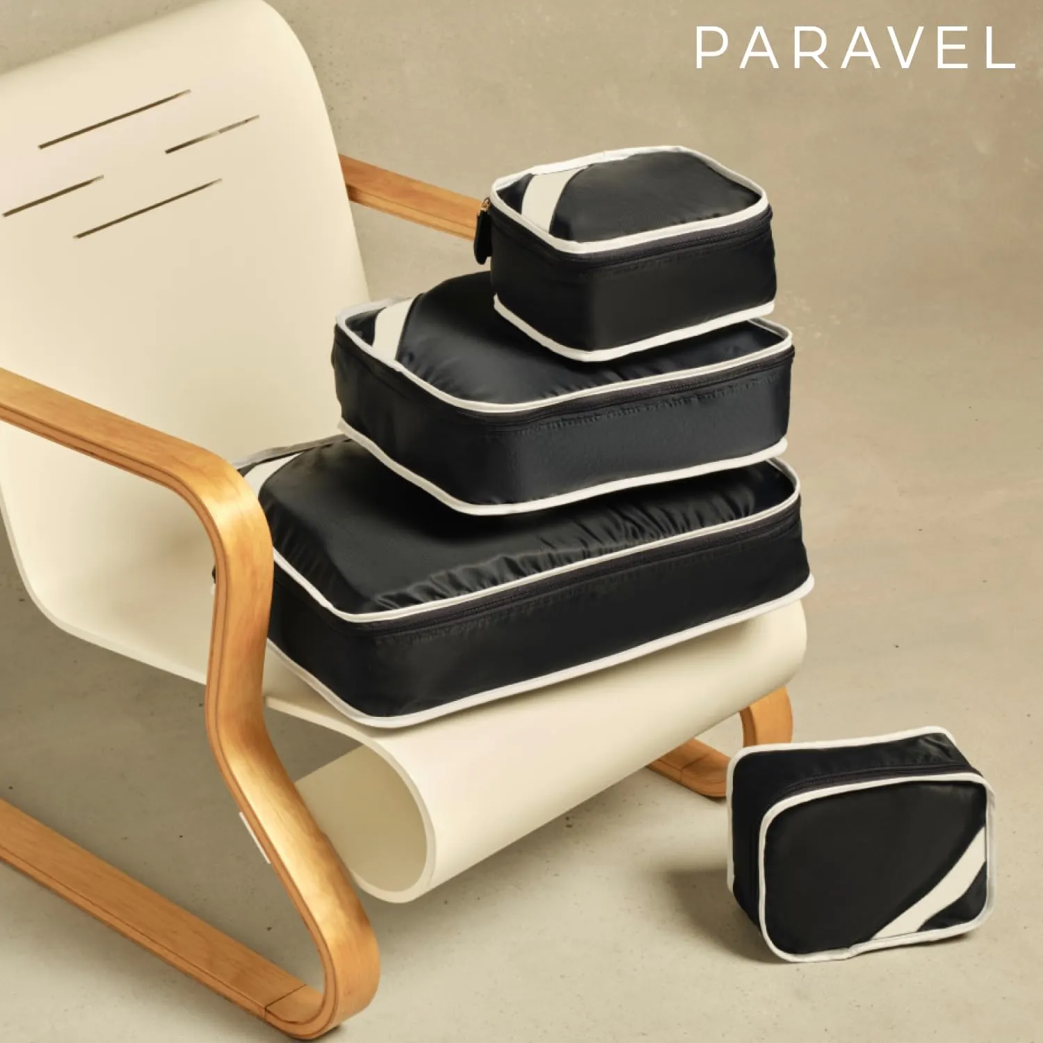 Paravel Packing Cube Quads | Luggage Organizer for Travel Accessories, Shoes, Toiletries, Laundry | 4 Pack Storage Cubes in Various Sizes | Derby Black